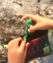 Load image into Gallery viewer, Clip on waist bag filled w/ essentials & toys for kids, toddlers and children | Black Colorful Space Galaxy Stocket Pocket